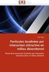 Particules localisées par interaction attractive en milieu désordonné