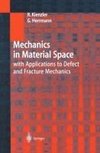 Mechanics in Material Space