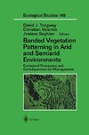 Banded Vegetation Patterning in Arid and Semiarid Environments