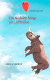 Ein Nashorn hängt am Luftballon