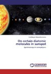 On certain diatomic molecules in sunspot