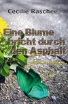 Eine Blume bricht durch den Asphalt