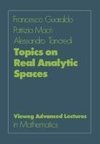 Topics on Real Analytic Spaces