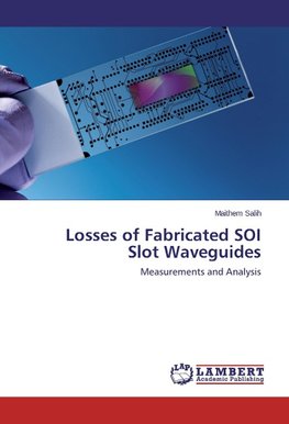 Losses of Fabricated SOI Slot Waveguides