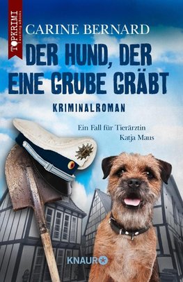 Der Hund, der eine Grube gräbt