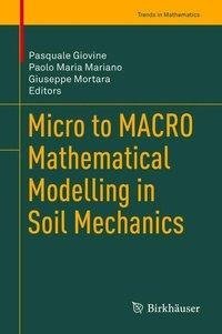 Micro to MACRO Mathematical Modelling in Soil Mechanics